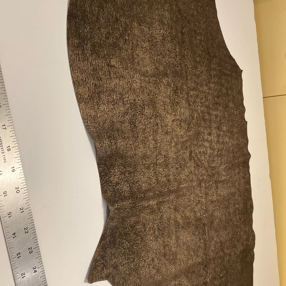 Exquisite gold printed fine lines on brown suede. 29” x 16”.  Large piece